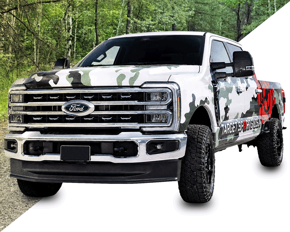 free truck giveaway from ammo plus photo of a ford f250 lariat in the woods with nice lighting